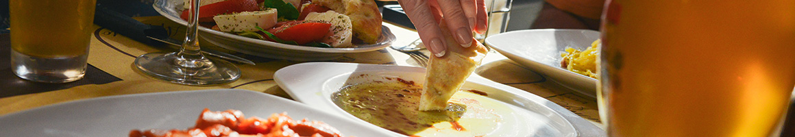 Eating Food Stand Hot Dog at Freddie's Hot Dog Stand restaurant in Boulder, CO.